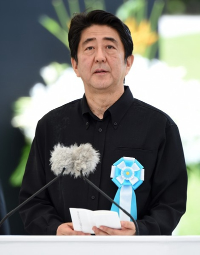 日本冲绳悼念二战死难者民众忧安保法再引战祸