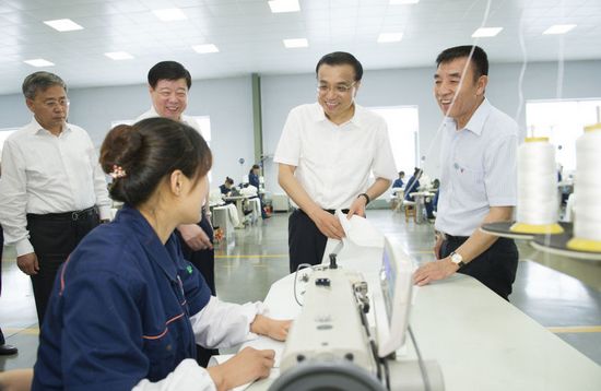 李克强赞环保企业理念:“化污泥为资源”