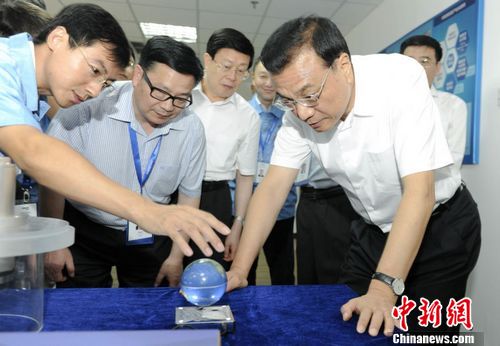 李克强邀现场媒体帮小微企业做“广告”