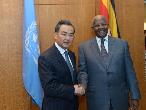 王毅会见第69届联大主席库泰萨