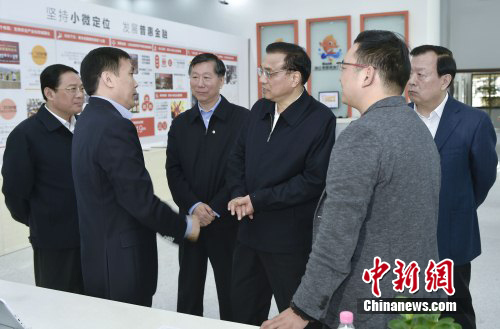 李克强向民营银行家推荐《钱商》