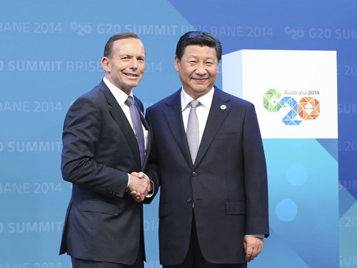 国家主席习近平与澳大利亚总理阿博特在g20领导人第九次峰会上握手