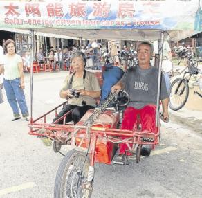 中国夫妇造三轮车环游世界抵大马面对签证问题