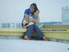 大马一女子携半岁女儿欲寻短被华裔警察救下(图)