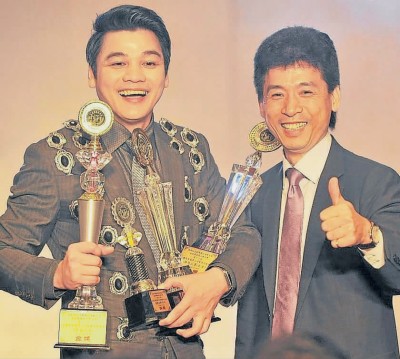 西装裁剪赛夺4奖华裔裁缝堪称“大马第一剪”