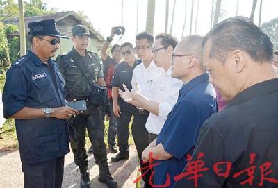 大马边佳兰华人义山迁坟仪式场面紧张军警围人墙