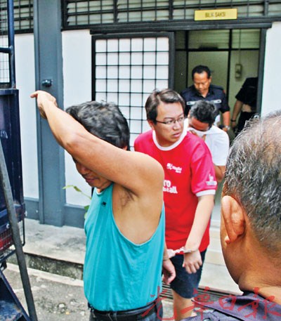 为护家人自卫打死劫匪马来西亚华裔父子被控谋杀