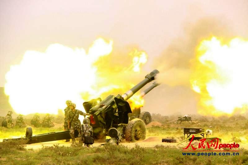 场面震撼兰州军区某炮兵团炮群怒射实弹