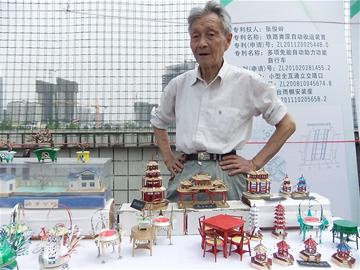 退休工程师自制易拉罐版微缩景观旧罐剪制楼亭
