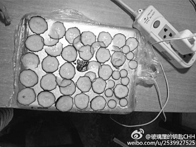 天气太热难充电大学生给iPad敷黄瓜面膜(图)