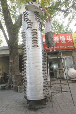 80后夫妻开馒头店一次蒸31层笼屉(图)