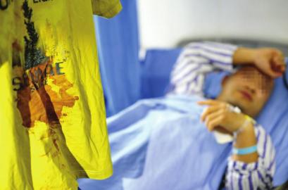 与专卖店保安起口角夫妻俩一人挨一刀(图)