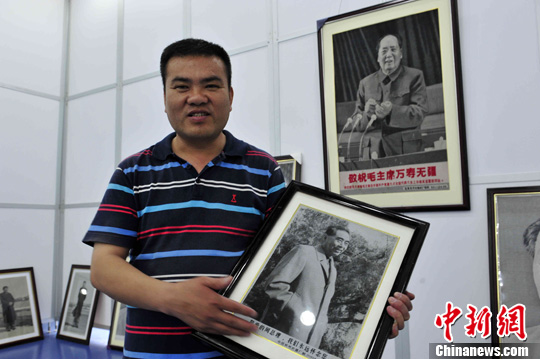 6月28日,为纪念中共建党90周年,大型红色收藏"开国伟人毛泽东丝织绣像