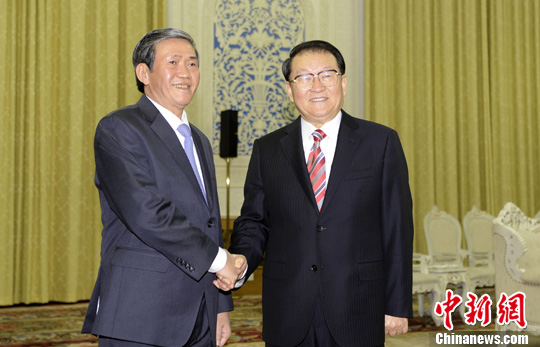 李长春会见越共中央政治局委员丁世兄