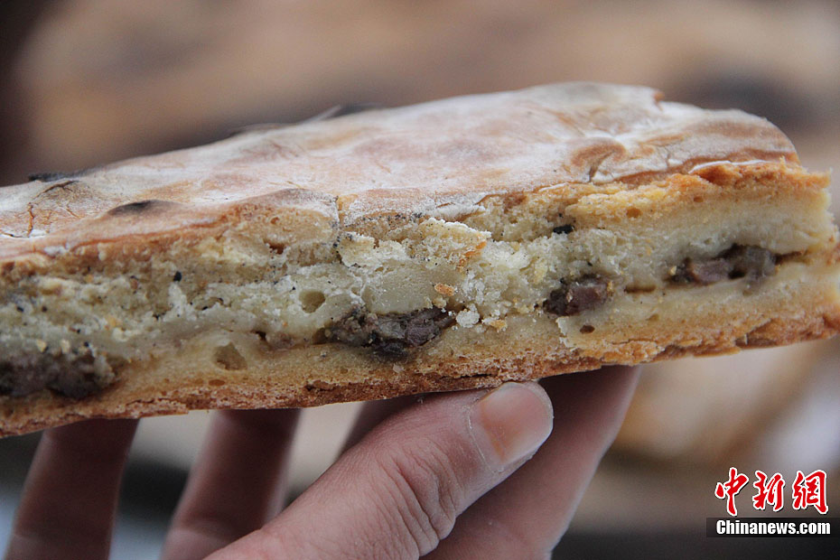 新疆烤出直径275米巨馕可供万人同时食用66