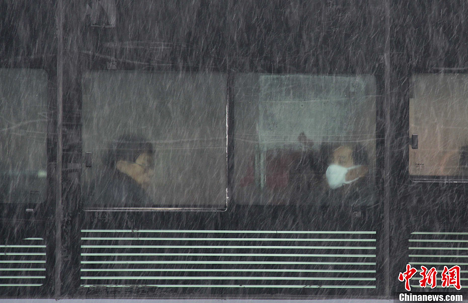 中国中东部地区出现雨雪天气 北京迎降雪