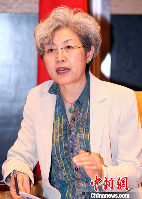 傅莹从首位少数民族女副外长到人大新闻发言人