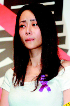 对同居模特女友施暴台一公司董事长被起诉(图)