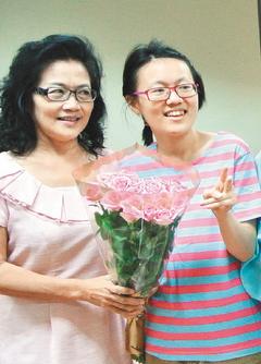 交双份学费台湾一母亲陪自闭症女儿上大学（图）