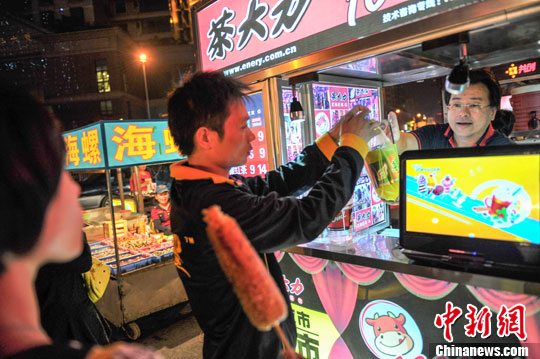 通讯:在桂台商小吃移植台湾夜市文化