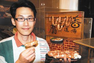 美石变“美食”牡蛎化石雕成香肠可乱真