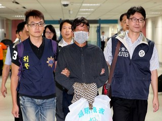 台湾经济犯苏智成潜逃大陆押解返台(图)