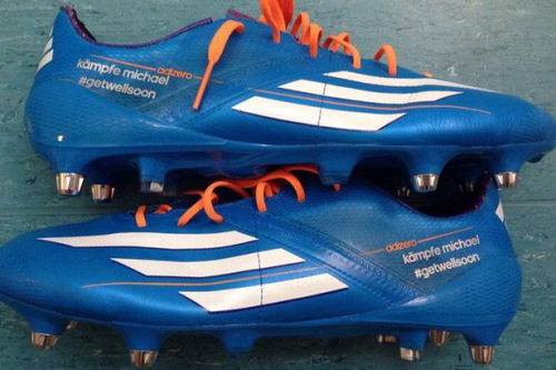 波多尔斯基新战靴印祝福舒马赫:战斗吧车王(图)