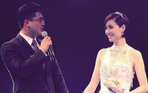 名将吴鹏与妻子完婚游泳界名人出席典礼(图)