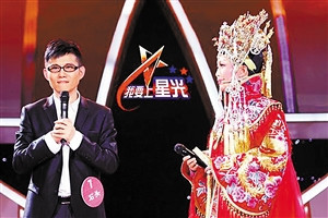 李玉刚与歌手石头因提成反目送死鸡恐吓(图)