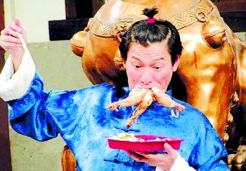 刘德华喜感旧照曝光扎冲天小辫狂啃三个鸡腿(图)