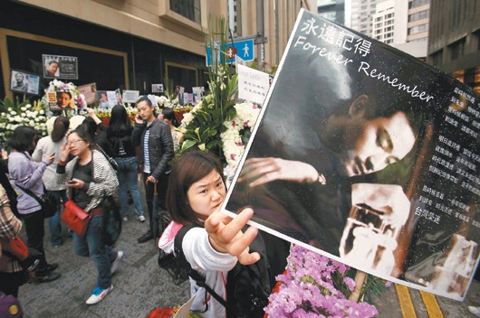 谭咏麟忆往事否认与张国荣是死对头(图)