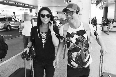 汤唯金泰勇开始蜜月旅行男方贴心抬行李(图)