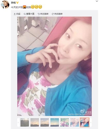 孙悦夕阳下自拍面带微笑被赞年轻美丽(图)