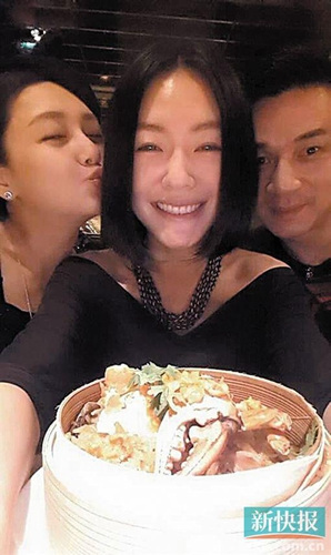 小S开心庆祝37岁生日老公、姐姐左右献吻(图)